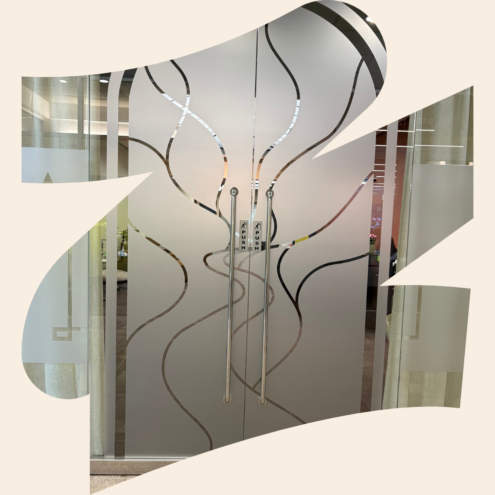 Frosted glass entrance doors at Zoya Health Collective in downtown Spokane